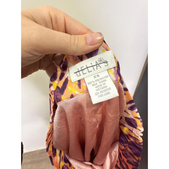 Delia’s hi-lo skirt with a vibrant, multi-colored orange purple pattern summer - Picture 9 of 9